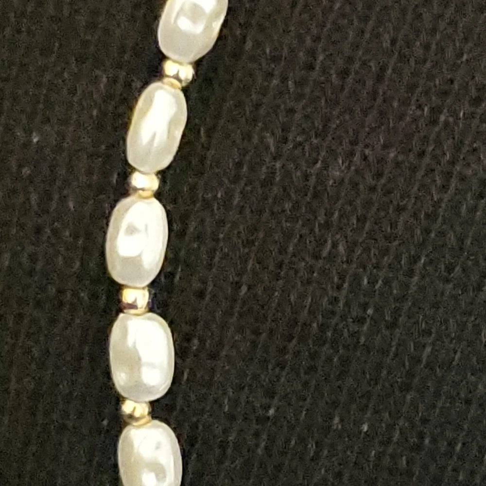 Vintage necklace with freshwater pearl and black onyx look beads